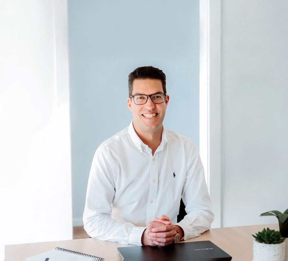 Ross Sergi, Director of Ancora Finance, at his desk